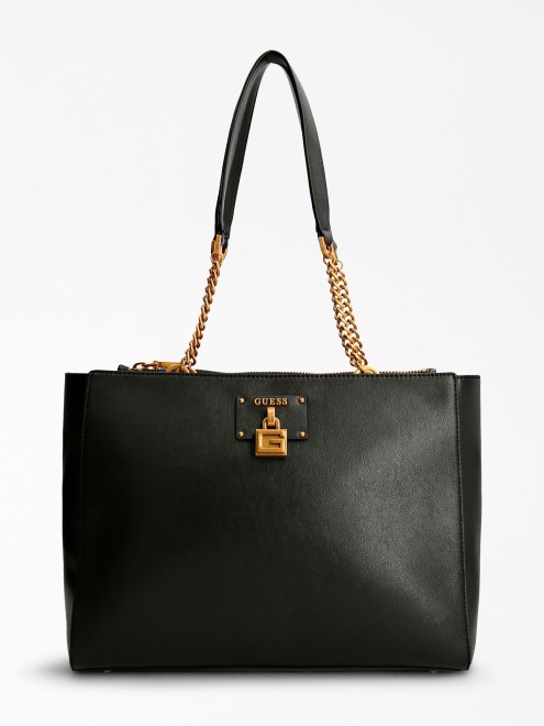 Bolso Shopper Negro En El Centro Del Escenario Con Cadenas Adivinar