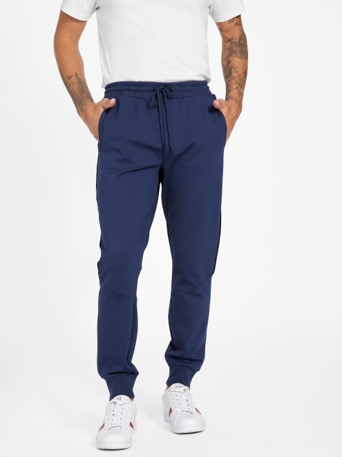 Joggers De Seda Azul Con Cinta Del Logo De Jon Guess